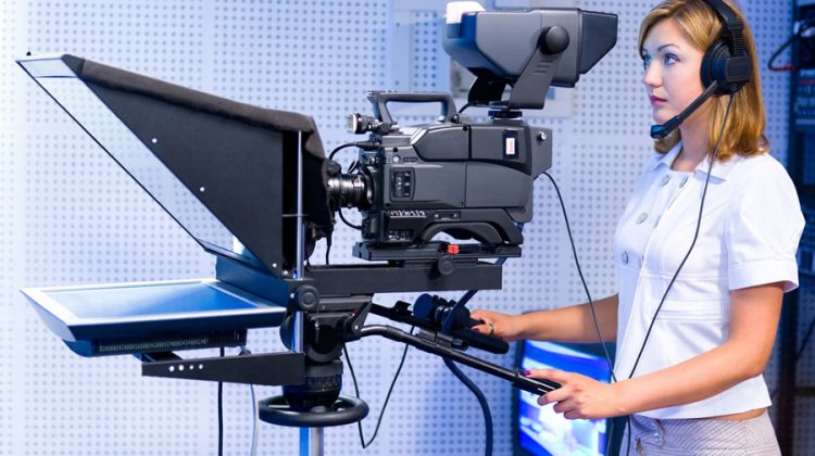 female teleprompter operator